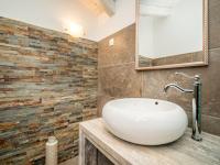 Kúpeľňa v ubytovaní Holiday Home Lapis by Interhome