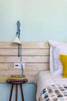 A bed or beds in a room at Kyma seaview Apartments, Episkopi beach Rethymno