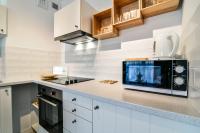 Kuchnia lub aneks kuchenny w obiekcie LTC Apartments Malczewskiego Centrum