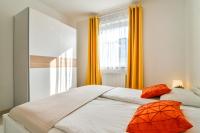 Łóżko lub łóżka w pokoju w obiekcie LTC Apartments Malczewskiego Centrum
