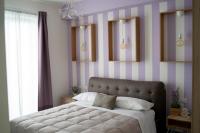 A bed or beds in a room at Anna & Alfredo bed and breakfast