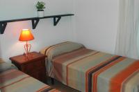 Postel nebo postele na pokoji v ubytování El Mirador