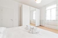 Posteľ alebo postele v izbe v ubytovaní Prato della Valle Roomy Flat
