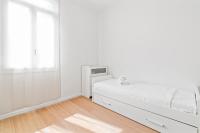 Posteľ alebo postele v izbe v ubytovaní Prato della Valle Roomy Flat