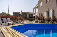 Bazén v ubytovaní Home Suites Home alebo v jeho blízkosti