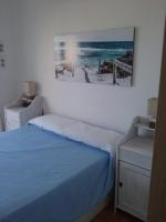 Posteľ alebo postele v izbe v ubytovaní APARTAMENTO JUNTO AL MAR EN LA COSTA DE ALMERIA