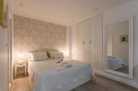 Posteľ alebo postele v izbe v ubytovaní Split Center Apartments