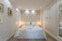 Posteľ alebo postele v izbe v ubytovaní Split Center Apartments