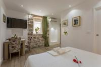 Posteľ alebo postele v izbe v ubytovaní Split Center Apartments