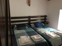 Łóżko lub łóżka w pokoju w obiekcie VTAR Don Benito, su casa rural en Gilena