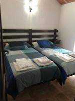 Łóżko lub łóżka w pokoju w obiekcie VTAR Don Benito, su casa rural en Gilena