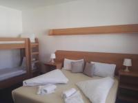 Postel nebo postele na pokoji v ubytování Hotel Jestřábí