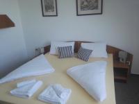 Postel nebo postele na pokoji v ubytování Hotel Jestřábí