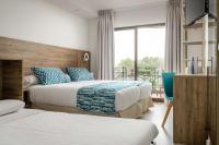 Postel nebo postele na pokoji v ubytování Hotel Boutique Calas de Alicante