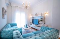 Televízia a/alebo spoločenská miestnosť v ubytovaní Acropolis deluxe Apt.(Must)