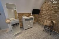 TV a/nebo společenská místnost v ubytování Yiasemi Corfu Luxury Studio