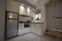 Kuchyň nebo kuchyňský kout v ubytování Yiasemi Corfu Luxury Studio