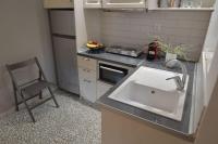 Kuchyň nebo kuchyňský kout v ubytování Yiasemi Corfu Luxury Studio