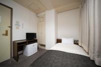 HOTEL CITY INN WAKAYAMA 和歌山駅前にあるベッド