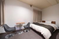 HOTEL CITY INN WAKAYAMA 和歌山駅前にあるベッド
