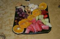 a tray of fruits and vegetables on a table at Chez Brahim vue panoramique in Aït Ben Haddou