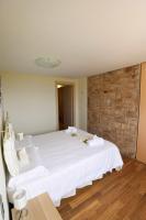 Łóżko lub łóżka w pokoju w obiekcie Maison Balù Villa