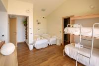 Łóżko lub łóżka w pokoju w obiekcie Maison Balù Villa