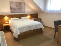 Posteľ alebo postele v izbe v ubytovaní Plitvice Miric Inn