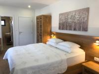 Posteľ alebo postele v izbe v ubytovaní Plitvice Miric Inn