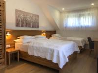 Posteľ alebo postele v izbe v ubytovaní Plitvice Miric Inn