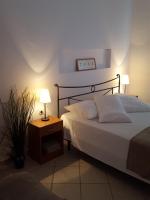 Posteľ alebo postele v izbe v ubytovaní Apartmani Katja