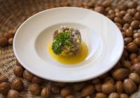 um prato de comida sobre uma mesa com feijão em Explora en Atacama - All Inclusive em San Pedro de Atacama