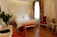 Postel nebo postele na pokoji v ubytování Corinne Art & Boutique Hotel