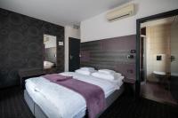 Posteľ alebo postele v izbe v ubytovaní Log In Rooms