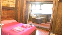 A bed or beds in a room at Casa O´Crego