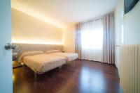 Postel nebo postele na pokoji v ubytování El Pi de Sant Just - Habitacions i Apartaments