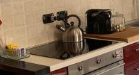 A kitchen or kitchenette at STARFLOWER HOUSE - IEO