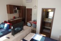 Posteľ alebo postele v izbe v ubytovaní Frank & Fang Apartments MK7