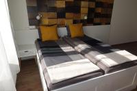 Posteľ alebo postele v izbe v ubytovaní Frank & Fang Apartments MK7