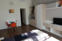 Televízia a/alebo spoločenská miestnosť v ubytovaní Frank & Fang Apartments MK7
