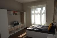 Posteľ alebo postele v izbe v ubytovaní Frank & Fang Apartments MK7