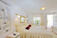 Postel nebo postele na pokoji v ubytování Apartments Brankica