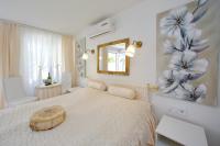 Postel nebo postele na pokoji v ubytování Apartments Brankica