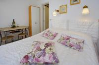 Postel nebo postele na pokoji v ubytování Apartments Brankica