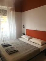 Posteľ alebo postele v izbe v ubytovaní marconi 22 rooms