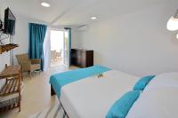 Postel nebo postele na pokoji v ubytování Apartments Brankica