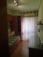 Postel nebo postele na pokoji v ubytování Apartamento GALLARZA con Parking
