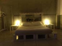 A bed or beds in a room at Comeacasatua