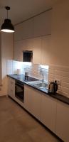 Kuchyňa alebo kuchynka v ubytovaní Apartament Kraków Arena