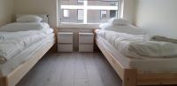 Posteľ alebo postele v izbe v ubytovaní Apartament Kraków Arena